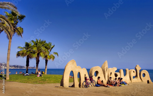 MALAGA, SPAIN - APRIL 20: Malagueta Beach entrance sign welcomes