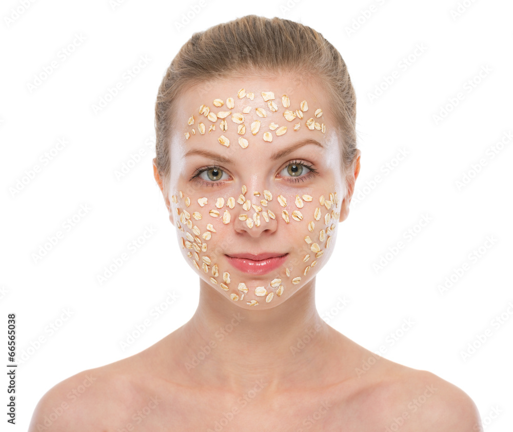 Young woman making oatmeal mask Young woman making oatmeal mask