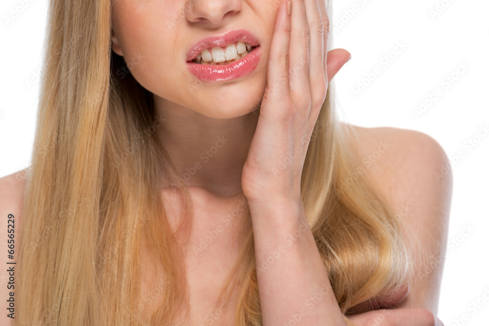 Closeup on teenager with toothache Closeup on teenager with toothache