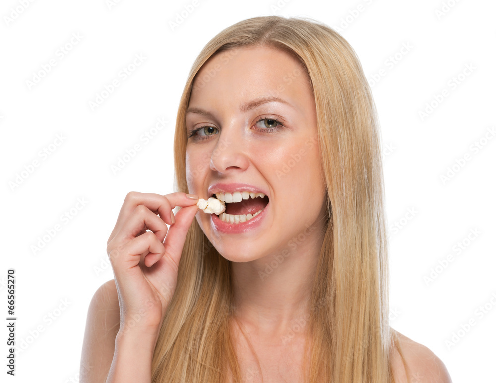 Portrait of happy teenager eating popcorn Portrait of happy teenager eating popcorn
