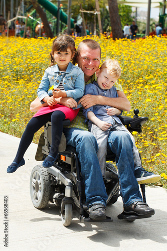 Dad play with son and daughter