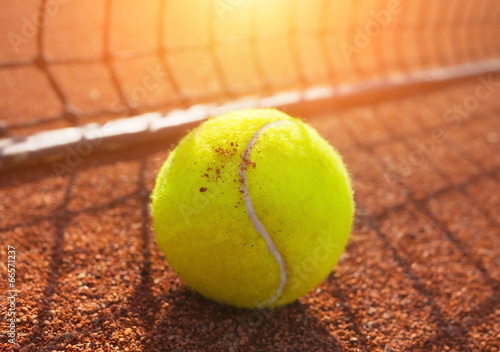 tennis ball on a tennis court © Mikael Damkier