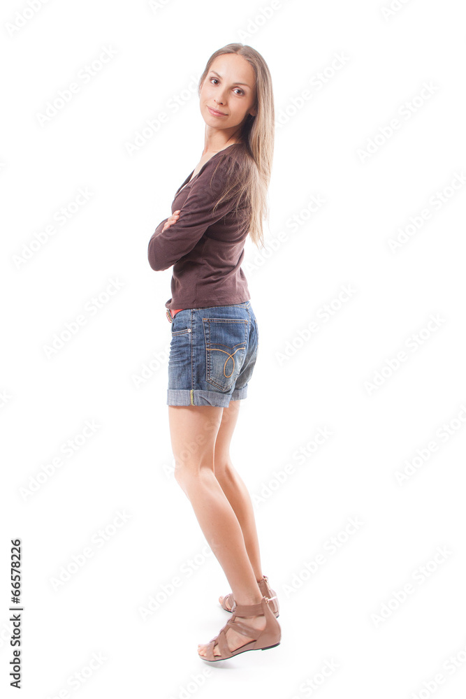 Beautiful woman in shorts, isolated on white Beautiful woman in shorts, isolated on white