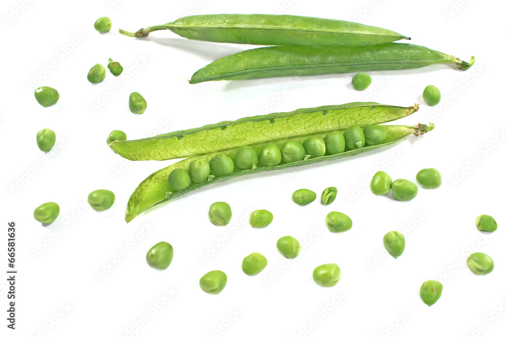 Fresh green peas on a white Fresh green peas on a white