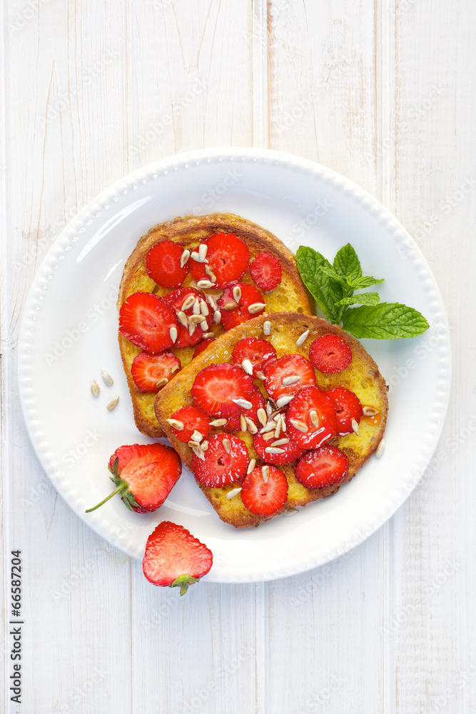 French toasts with fresh strawberries French toasts with fresh strawberries