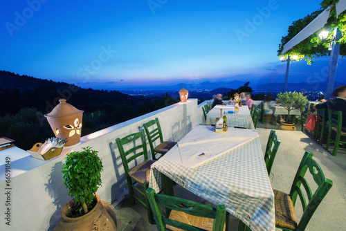 KOS, GREECE - JUNE 6, 2014: Restaurant view at night in Zia vill photo