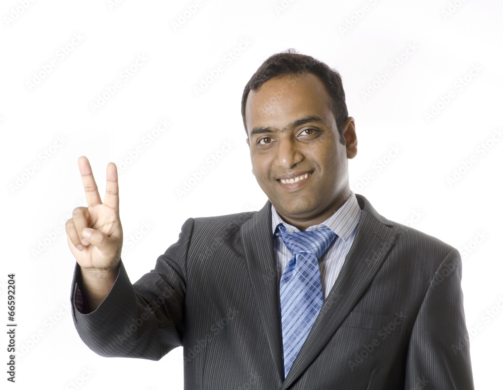 An Indian businessman showing appreciation. An Indian businessman showing appreciation.