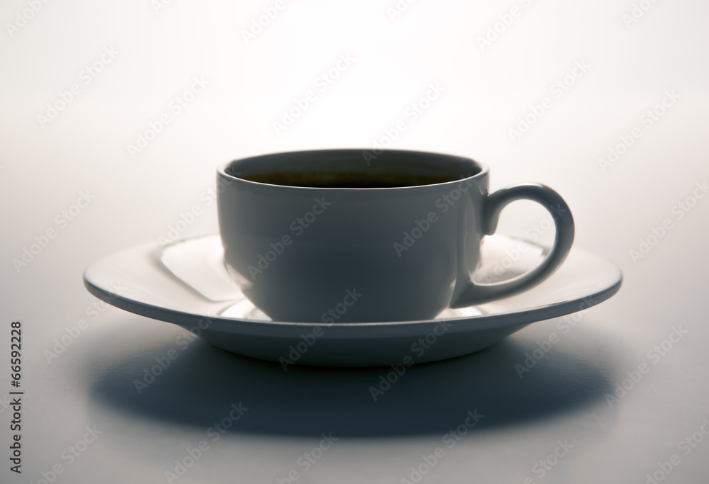 Fototapeta premium glass cup and saucer closeup