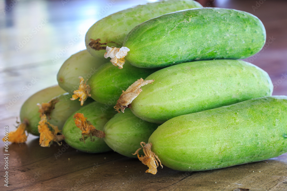 Fresh Cucumbers on the Wooden Table.
