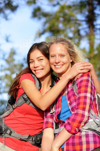 Girlfriends - happy young women hiking portrait © Maridav