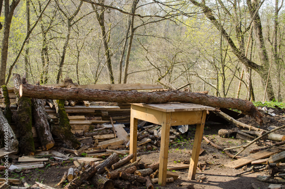 board logs piles and wooden table for cutting log board logs piles and wooden table for cutting log