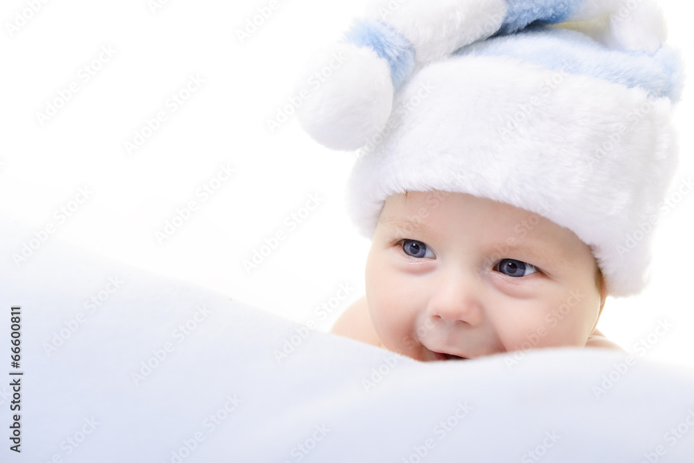 christmas cute baby boy lying on blue soft plaid like on snowdri christmas cute baby boy lying on blue soft plaid like on snowdri