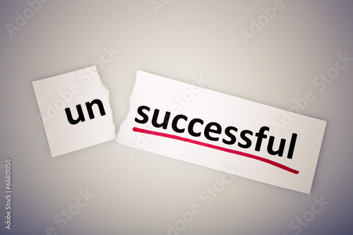 Obraz na płótnie The word unsuccessful changed to successful on torn paper w salonie