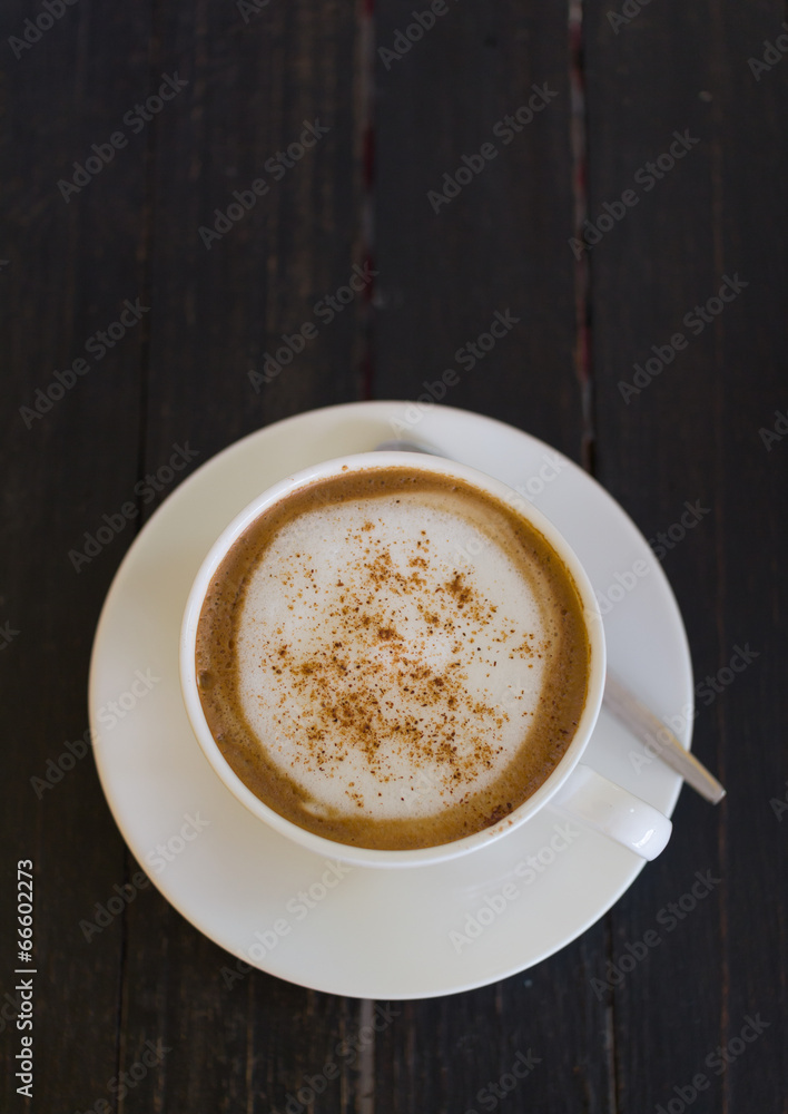Fototapeta premium coffee cup on wood black table