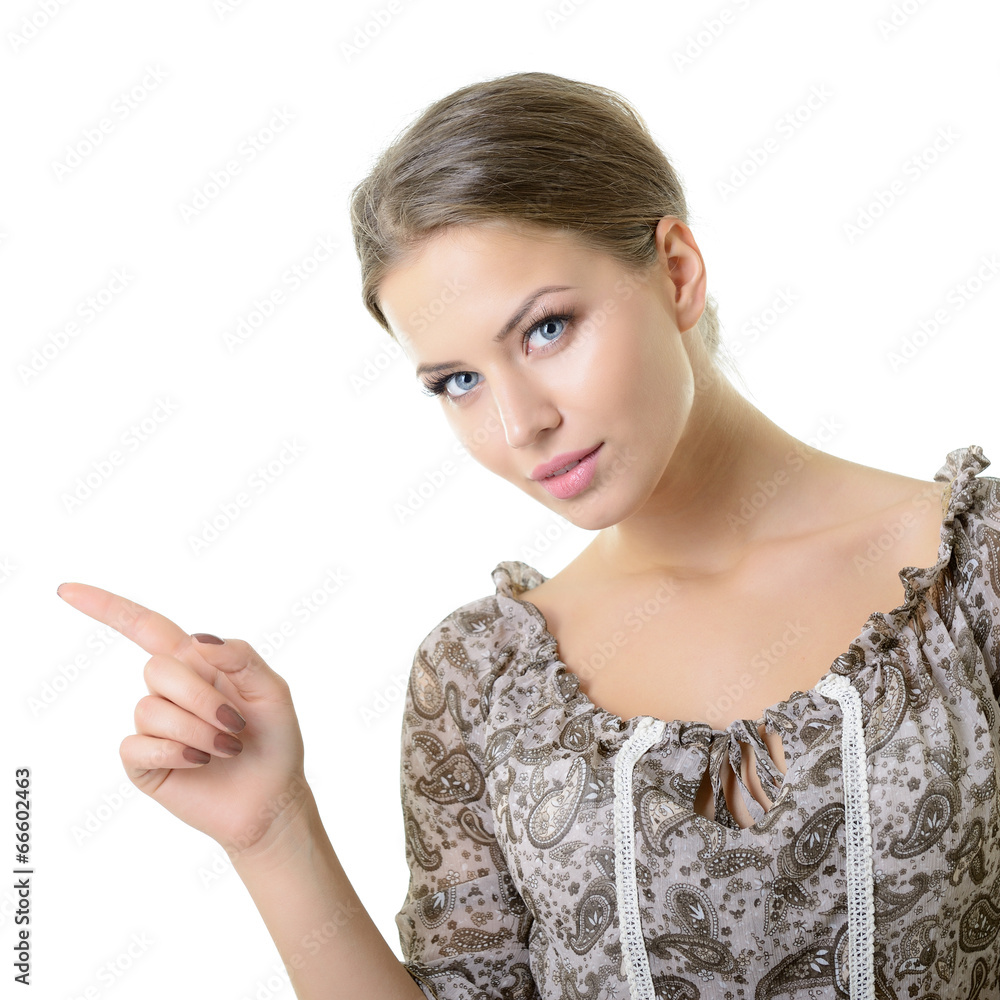 Beautiful woman pointing with her finger at copyspace, isolated Beautiful woman pointing with her finger at copyspace, isolated