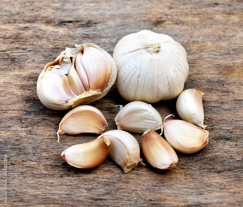 Still-life with garlic cloves on a wood