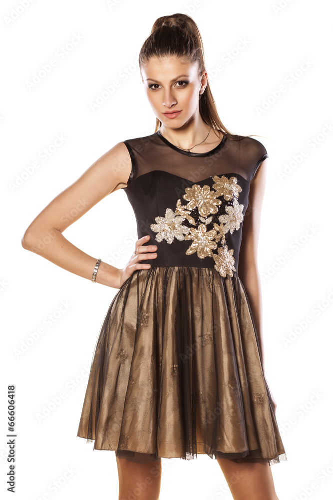 attractive girl posing in short evening dress attractive girl posing in short evening dress