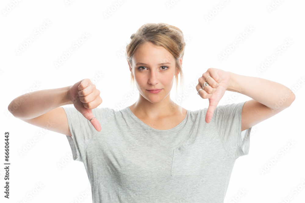 Fototapeta premium Mädchen zeigt Daumen nach unten