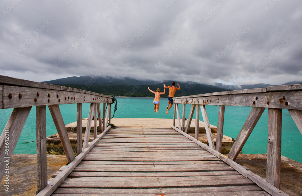 A young couple cool off at Mystery Island, Vanuatu 