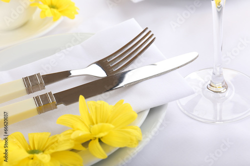 Table setting with spring flowers close up