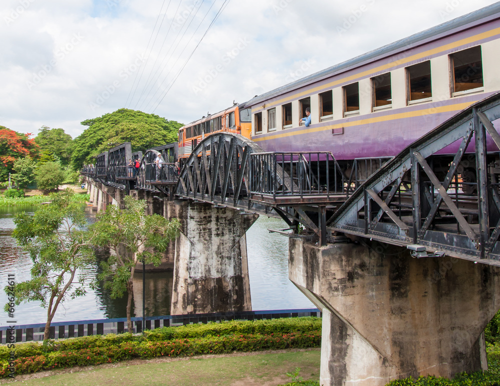 Train on the bridge over river Kwai in Kanchanaburi, Thailand