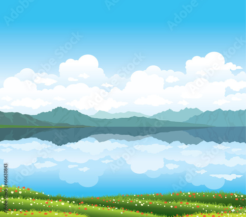 Nature landscape with grass and lake.