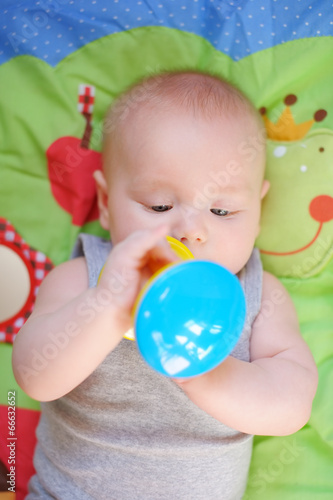 Baby play with bright toy