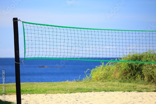  volleyball green net and playing court outdoor
