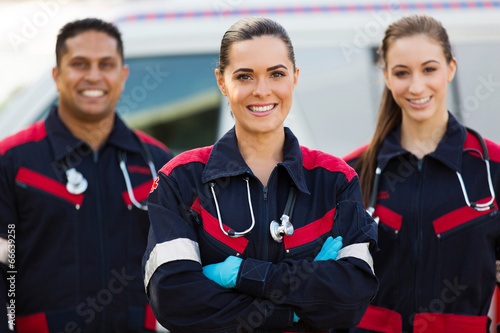 beautiful young EMT and colleagues photo