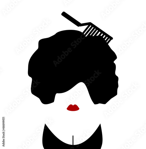 woman with afro comb in hair