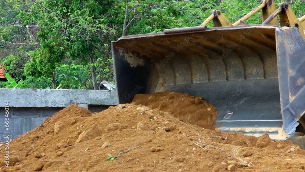 Earthmover dozer doing earthmoving works outdoors. Video Earthmover dozer doing earthmoving works outdoors. Video