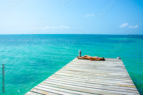 Girl relaxing on Jetty 