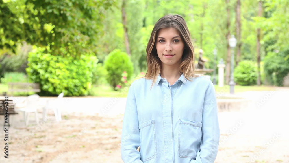 Young Woman Looking at Camera Outdoor Young Woman Looking at Camera Outdoor
