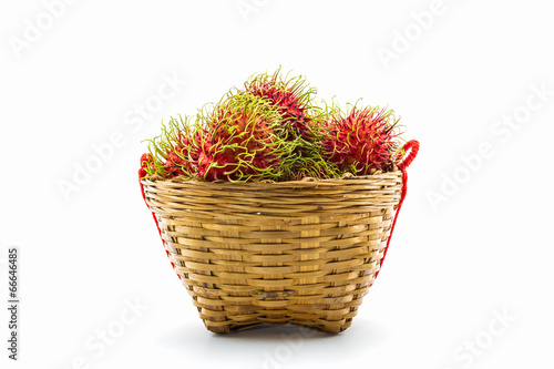 Rambutan fruit in basket.