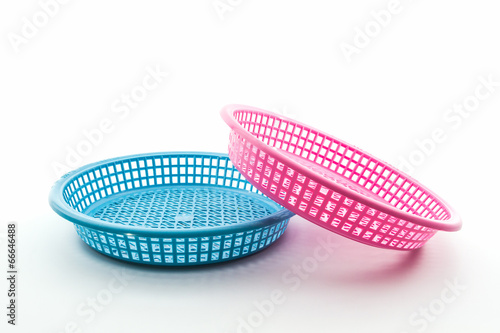 Pink and blue plastic basket. © amnach