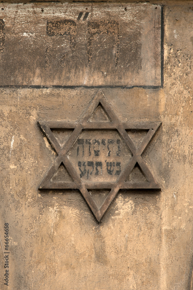 Naklejka premium Star of David on the wall of historic Kazimierz, Krakow