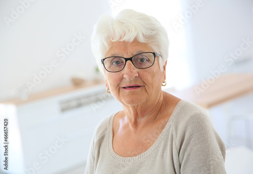 Portrait of elderly woman with eyeglasses