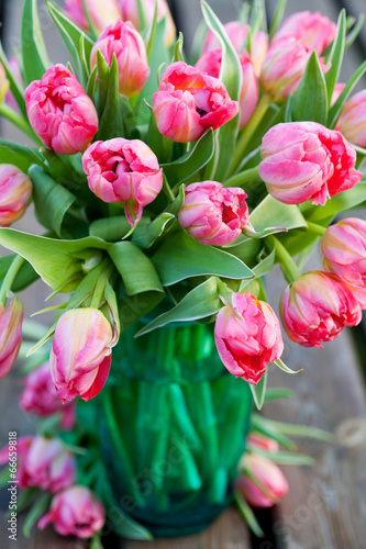 Fototapeta Naklejka Na Ścianę i Meble -  Bouquet of beautiful pink tulips in vase