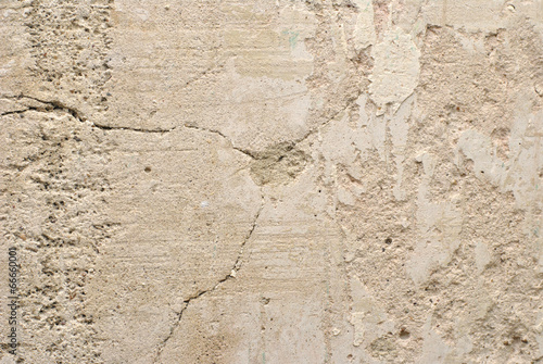 the crack in the old plaster of the wall