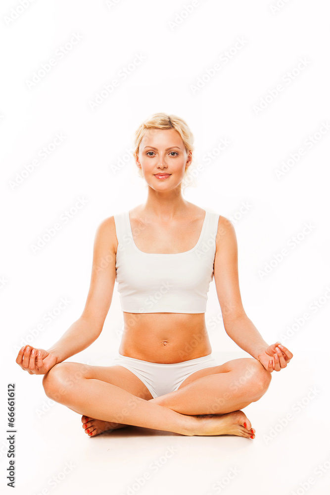 Young woman doing yoga exercise on white background Young woman doing yoga exercise on white background