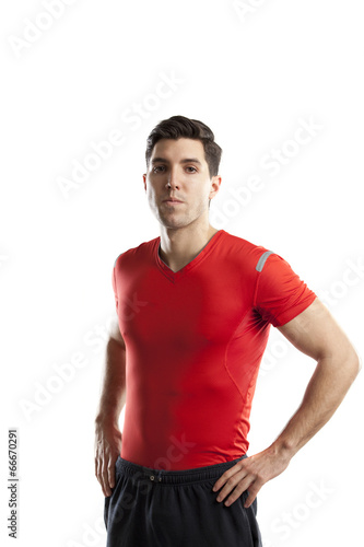 young man posing in sports outfit © arizanko