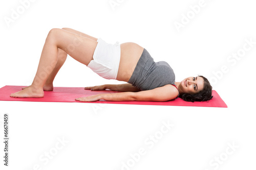 Active pregnant woman working out