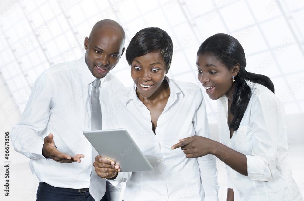 Fototapeta premium Three african business people with tablet PC