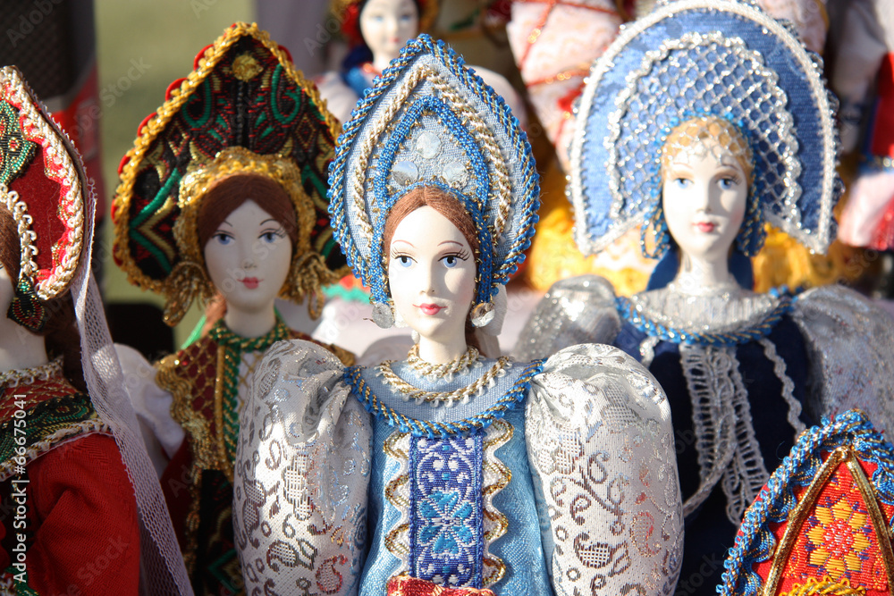 Russian dolls in traditional national russian clothes
