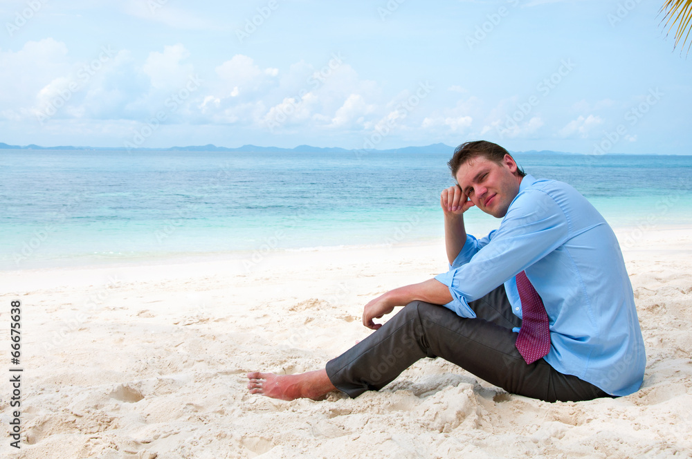 Business man on the beach