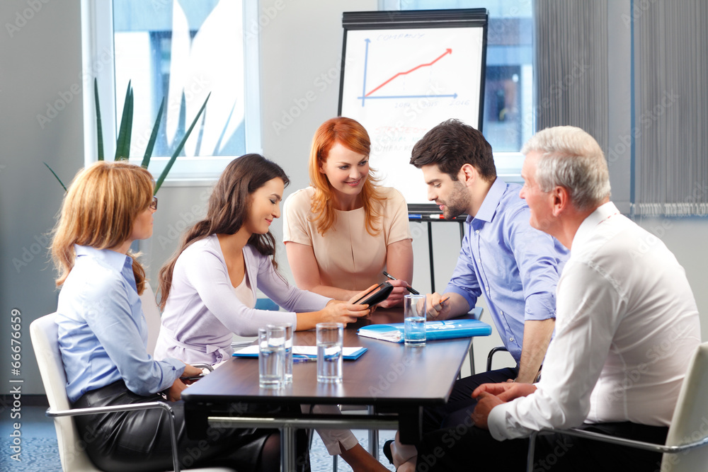 Business people discussing at meeting