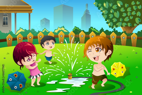 Children playing with sprinkler water in the summer