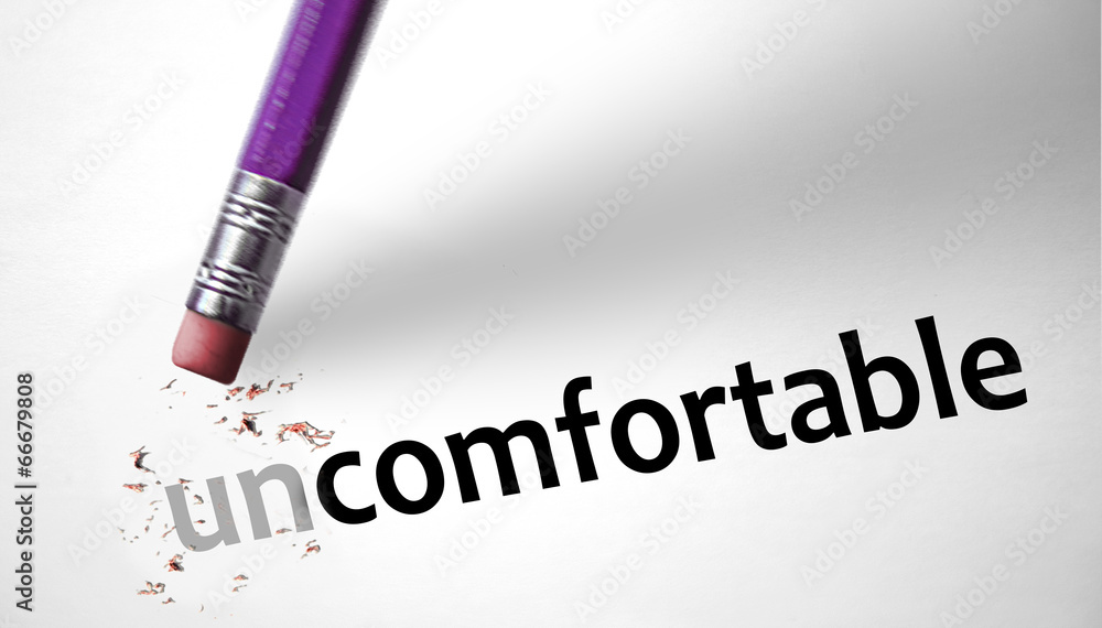 Fototapeta premium Eraser changing the word Uncomfortable for Comfortable