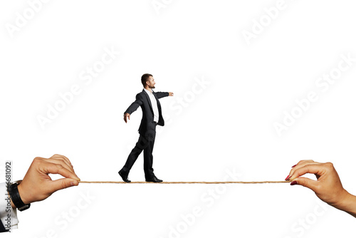 Obraz na plátně man walking on the rope