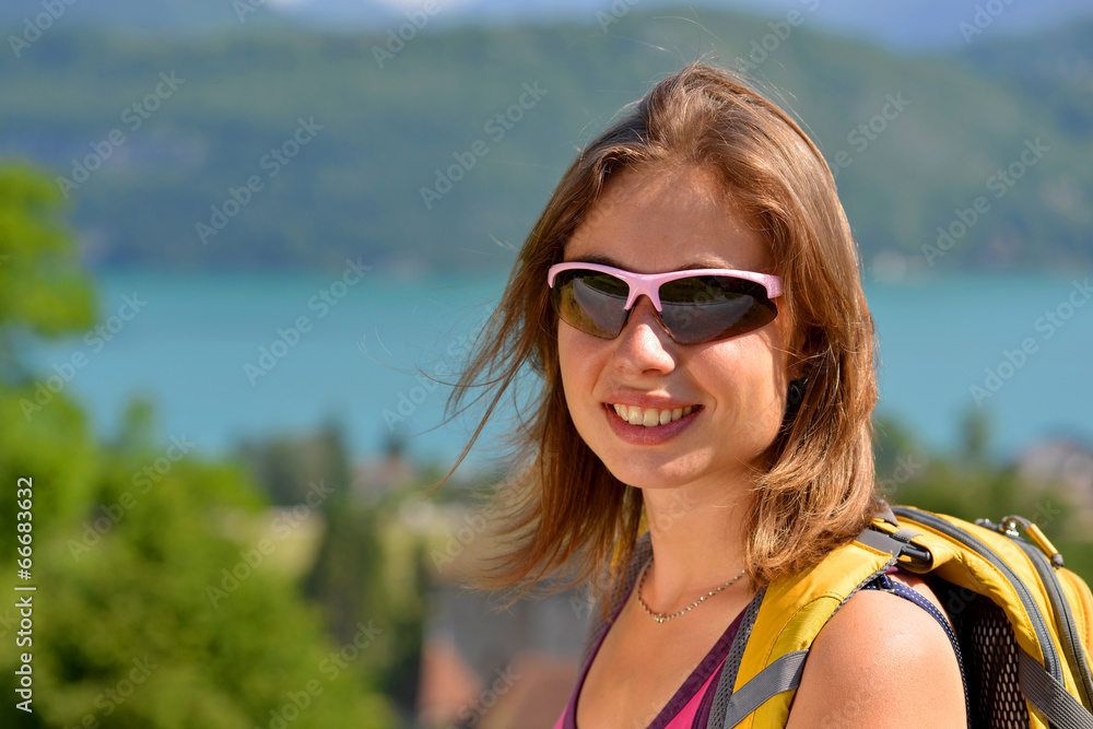 young woman is hiking in the French Alps young woman is hiking in the French Alps